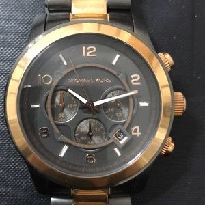 Authentic Michael Kors large faced watch.